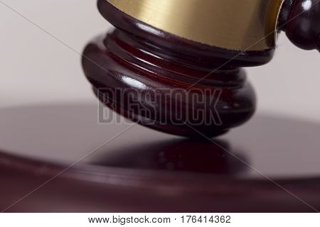 Close up of a judge gavel in a courtroom. Selective focus