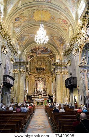 People During The Prayer In The Church Of Varallo