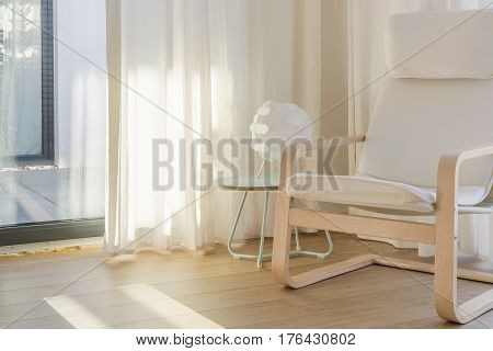 Interior With White Chair And Curtains