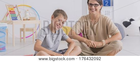 Female Pedagogue With A Boy