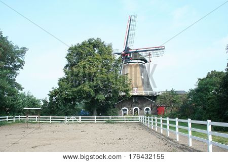Netherlands Cuijk july 2016: The windmill Katwijkse Molen is an old corn-mill