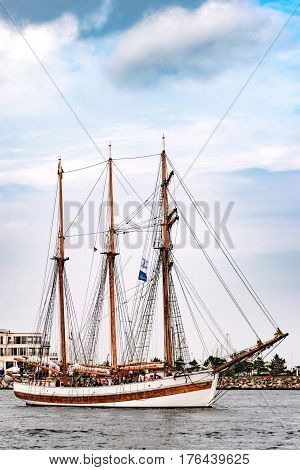 Rostock, Germany - August 2016: Sailing ship on the baltic sea. Hanse-Sail Warnemuende at port Rostock, Mecklenburg-Vorpommern, Germany. Tall Ship.Yachting and Sailing travel. Cruises and holidays