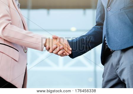 Successful Business Peolple Handshaking After Good Deal.