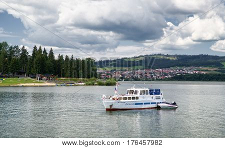 NAMESTOVO SLOVAKIA - JULY 28: Boat on water reservoir Oravska priehrada on July 28. 2016 in Namestovo