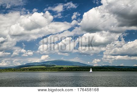 Sailing on water reservoir Oravska priehrada Slovakia