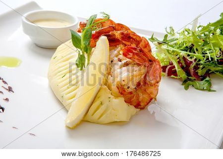 Stir Fry Shrimp. Fried Shrimps With Mashed Potatoes With Sauce On A White Plate Garnished With Fresh