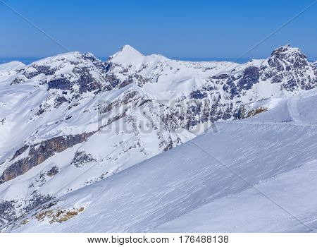Summit of the Swiss Alps, view from Mt. Titlis in winter. The Titlis is a mountain in Switzerland, located on the border between the Swiss cantons of Obwalden and Bern.
