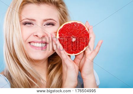 Woman Holds Grapefruit Citrus Fruit In Hands
