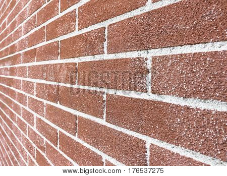 Close up of brick wall ending in infinity with shallow DOF.