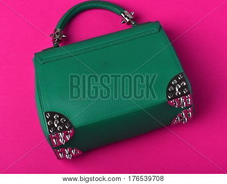 Small Womans Leather Green Bag With Metallic Spikes On Pink