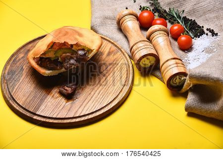 Calzone Or Pie With Vegetables, Pepperbox And Saltcellar On Tray