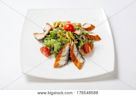 Salad Lettuce With Pieces Of Grilled Fish, Tomatoes And Grated Cheese