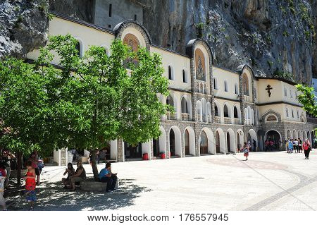 Believers Visiting The Ostrog Monastery Near Danilovgrad On Montenegro