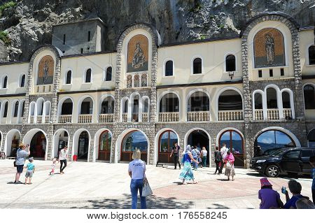 Believers Visiting The Ostrog Monastery Near Danilovgrad On Montenegro
