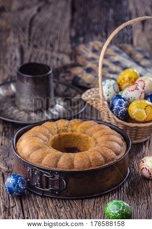 Marble cake.Easter Cake.Marble cake cup of coffee powder sugar kitchen vintage utensil and easter eggs.