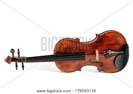 Reclined standard violin made of wood isolated on white