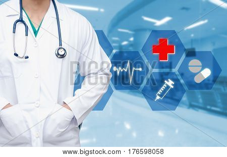 smart doctor with a stethoscope around his neck with health care icons and hexagonal shaped pattern on the hospital blurred background, medical technology concept.