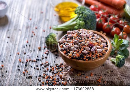 Lentils and beans in bowl vegan and vegetarian cooking ingredients with vegetables healthy food clean eating vegan protein