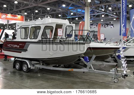 MOSCOW - MARCH 09 2017: Boat Victory 630 Cabin PRO for 10 International boat show in Moscow. Russia.