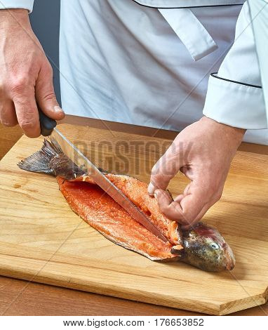 Cook cuts fish collection of food recipes