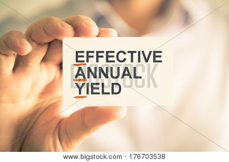 Businessman Holding Card With Eay Effective Annual Yield Acronym Text