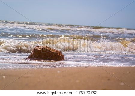 Pamorama of beautiful seascape. Rock on beach near the water