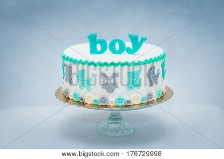 baby shower cake on white background. handicraft