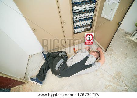 electrician electrocuted lying on the ground. accident
