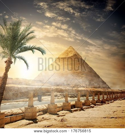 Pyramid of Khafre near road at sunlight