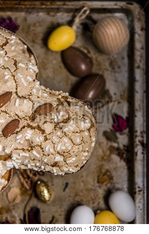 easter, sweet, cake, coloba, rabbit, egg, chocolate celebration, catholic, christian, tradition, family
Colomba, Italian sweet easter cake, dark and rustic mood.