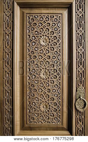 Close-up of a traditional carved wooden door, Uzbekistan