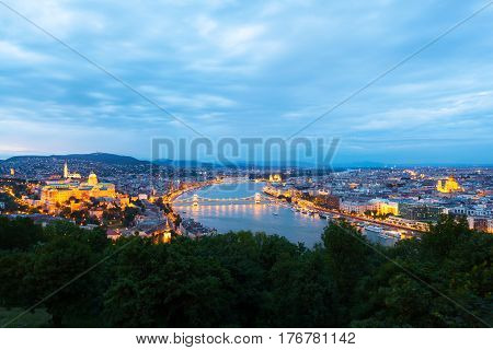 Evening panorama of Budapes from Gellert Hill with a beautiful sunset sky