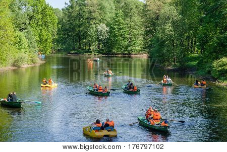 Saint Petersburg, Russia - may 15, 2016: Many vacationers boating on the lake in the city Park