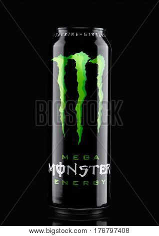 London, Uk - March 15, 2017:  A Can Of Monster Energy Drink On Black. Introduced In 2002 Monster Now