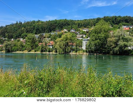 The Aare river in Switzerland in summertime, view from the city of Aarau - the capital of the Swiss canton of Aargau. The Aare is the longest river that both rises and ends entirely within Switzerland.