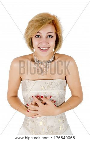 Happy girl in a white evening dress and necklace. Bare shoulders. Butch. Isolated on white background