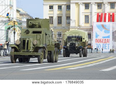 SAINT PETERSBURG, RUSSIA - MAY 05, 2015: Armored car BA-3 and car GAZ-AA at the rehearsal of the parade in honor of Victory Day