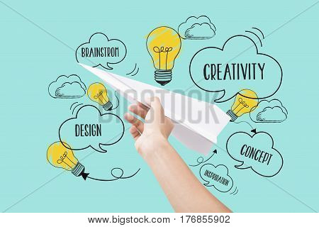 Hand holding paper plane. concept new idea with innovation and creativity.