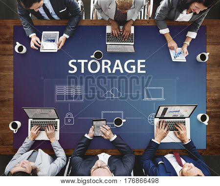 Group of people working on laptop network graphic overlay