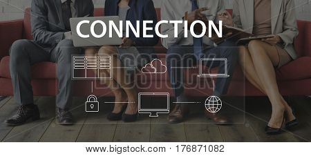 Group of people working on laptop network connection graphic overlay