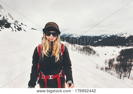 Woman climber hiking in mountains Travel Lifestyle success concept adventure active vacations outdoor mountaineering sport