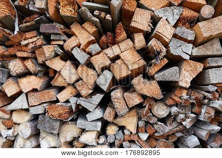 Pile of cut and cleaved firewood. Background.
