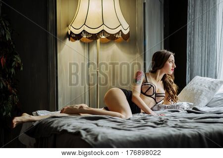 Boudoir Photo Of Sexy Girl Wearing Stylish Black Lingerie Underwear Posing In The Bedroom
