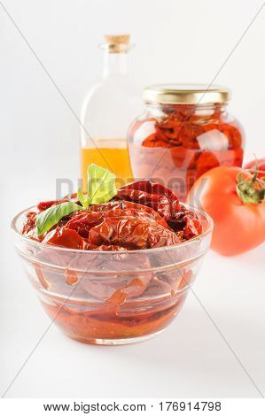 Italian appetizer - sundried tomato in bowl and glass jar.