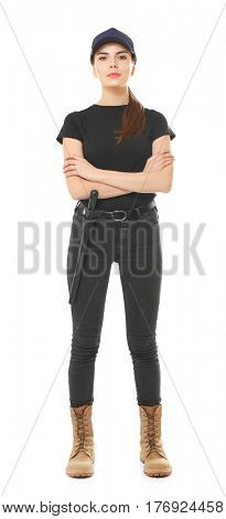 Beautiful young woman in security uniform on white background