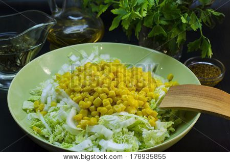 Fresh vegetable and dietary salad from cabbage and corn