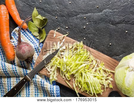 Beets, Carrots And Cabbage During Cooking. Composition On A Dark Background.