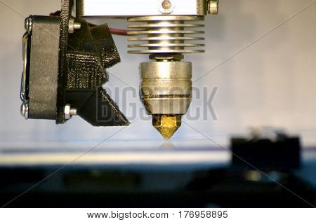Modern 3D printer printing figure close-up macro. Automatic three dimensional 3d printer performs plastic modeling in laboratory. 3d-printing processing with white background
