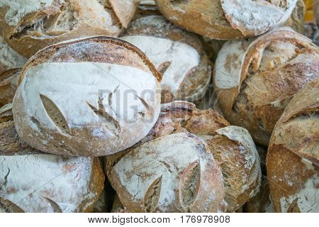 round french boule bread on tray - food background