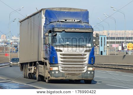 ST PETERSBURG, RUSSIA - MARCH 09, 2017: Truck-trailer SCANIA G400 4X2 on the highway close-up